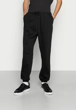 Weekday SEBBE NARROW - Pantalon de survêtement Men