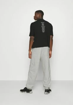 Weekday ETHAN OVERSIZED SWEATPANTS - Pantalon de survêtement All -France Weekday Soldes Boutique 3816a9dc2119461f98cce5f4cca83949