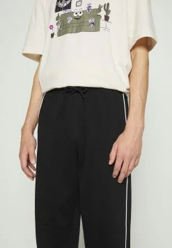 Weekday STANDARD PIPING UNISEX - Pantalon de survêtement All -France Weekday Soldes Boutique 96fb10790ccb4b3b9450bea0e99479ba