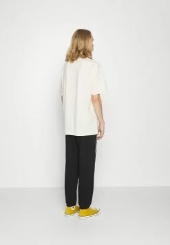 Weekday STANDARD PIPING UNISEX - Pantalon de survêtement All -France Weekday Soldes Boutique d6e711721dcf47458ff47f45f08bf0bd